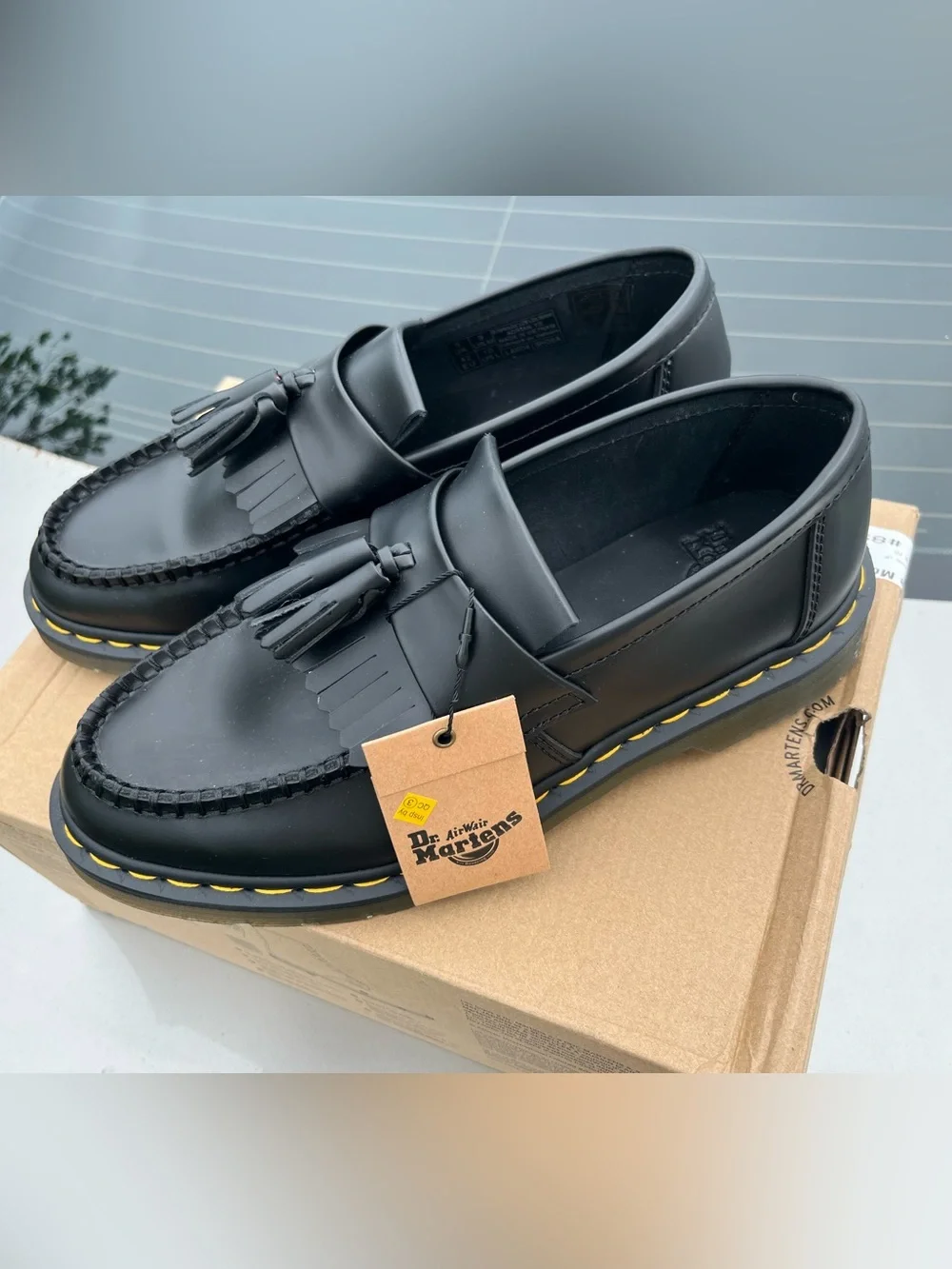 Dr. Martens Black Tassel Kiltie Loafers with Yellow Stitching